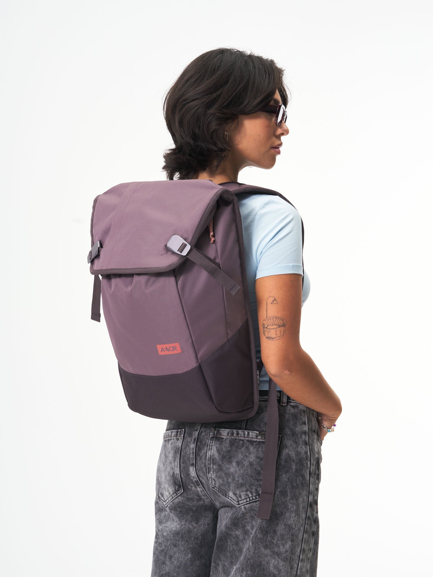 AEVOR-Daypack-Oxy-Purple-model-female-front