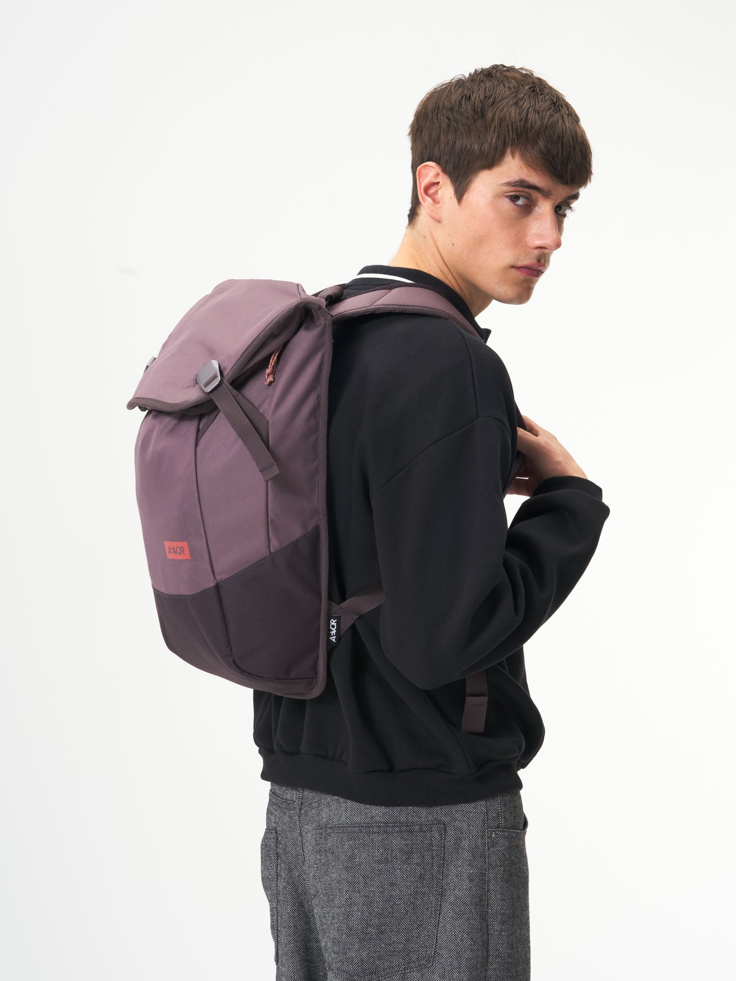 AEVOR-Daypack-Oxy-Purple-model-male-side