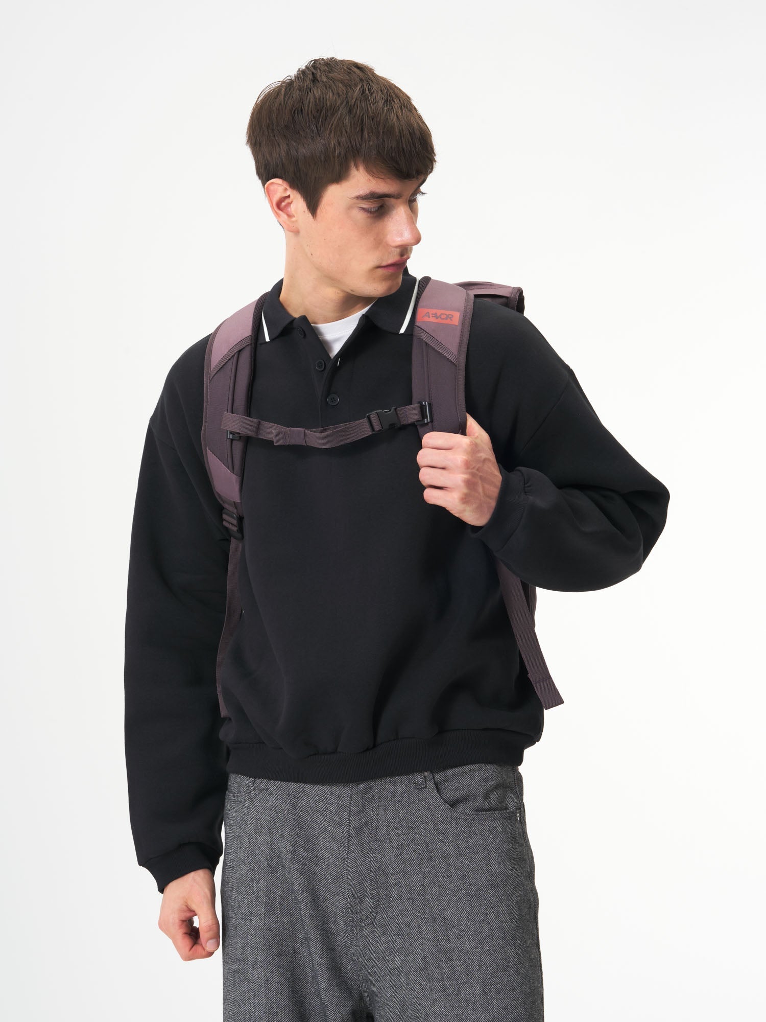 AEVOR-Daypack-Oxy-Purple-model-male-back