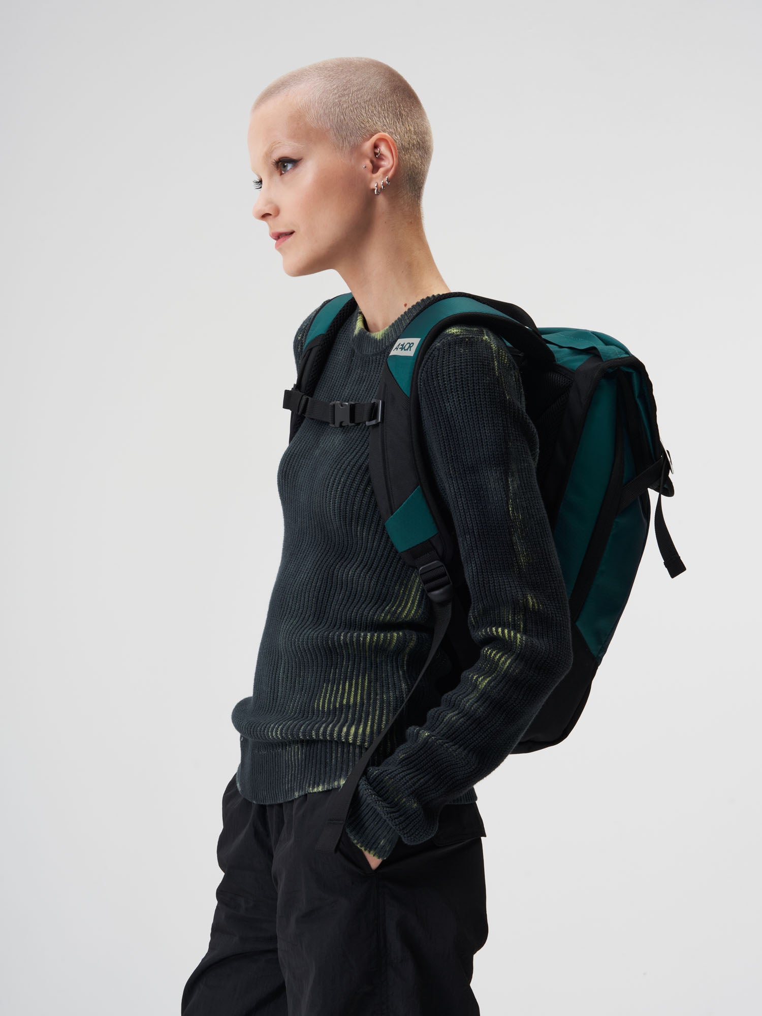 AEVOR-Daypack-Proof-Evergreen-model-female-side