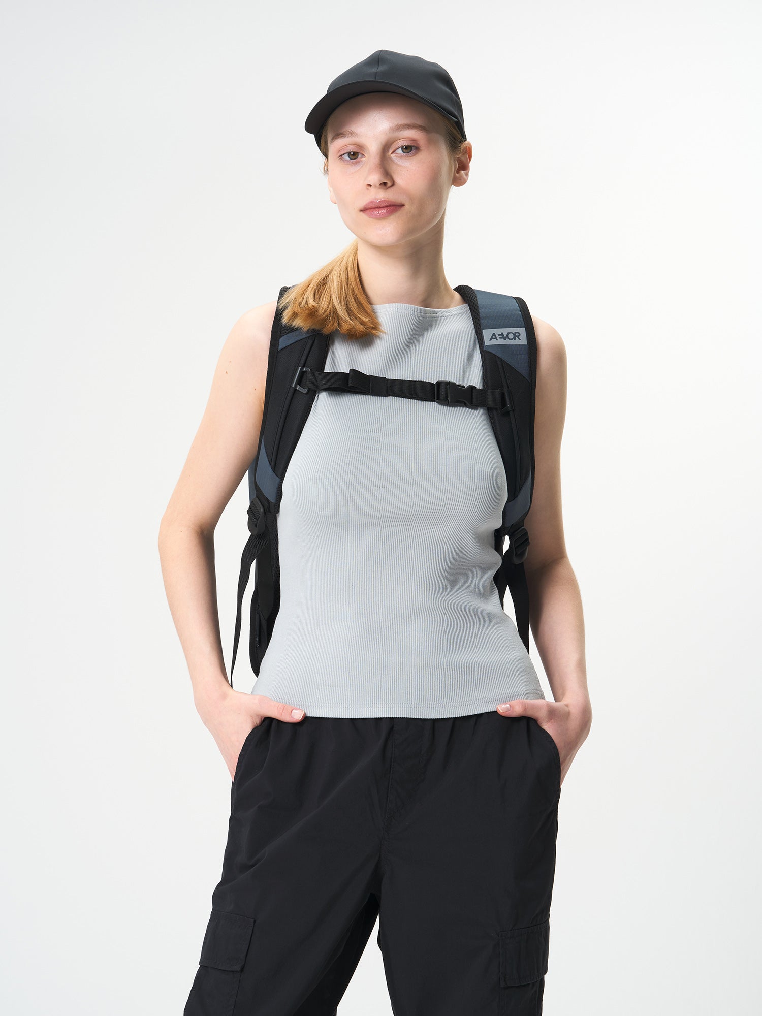 AEVOR-Daypack-Proof-Petrol-model-back