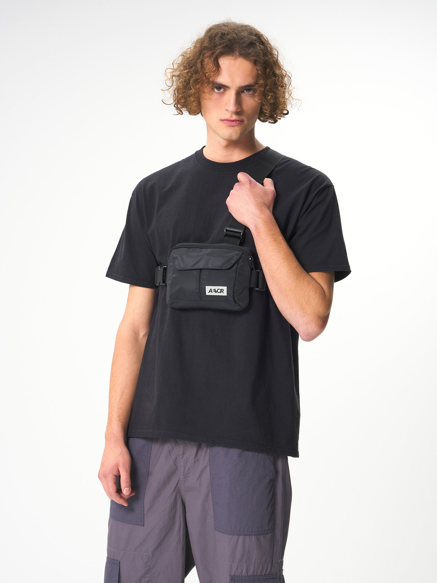 AEVOR-Front-Pack-Ripstop-Black-model-front