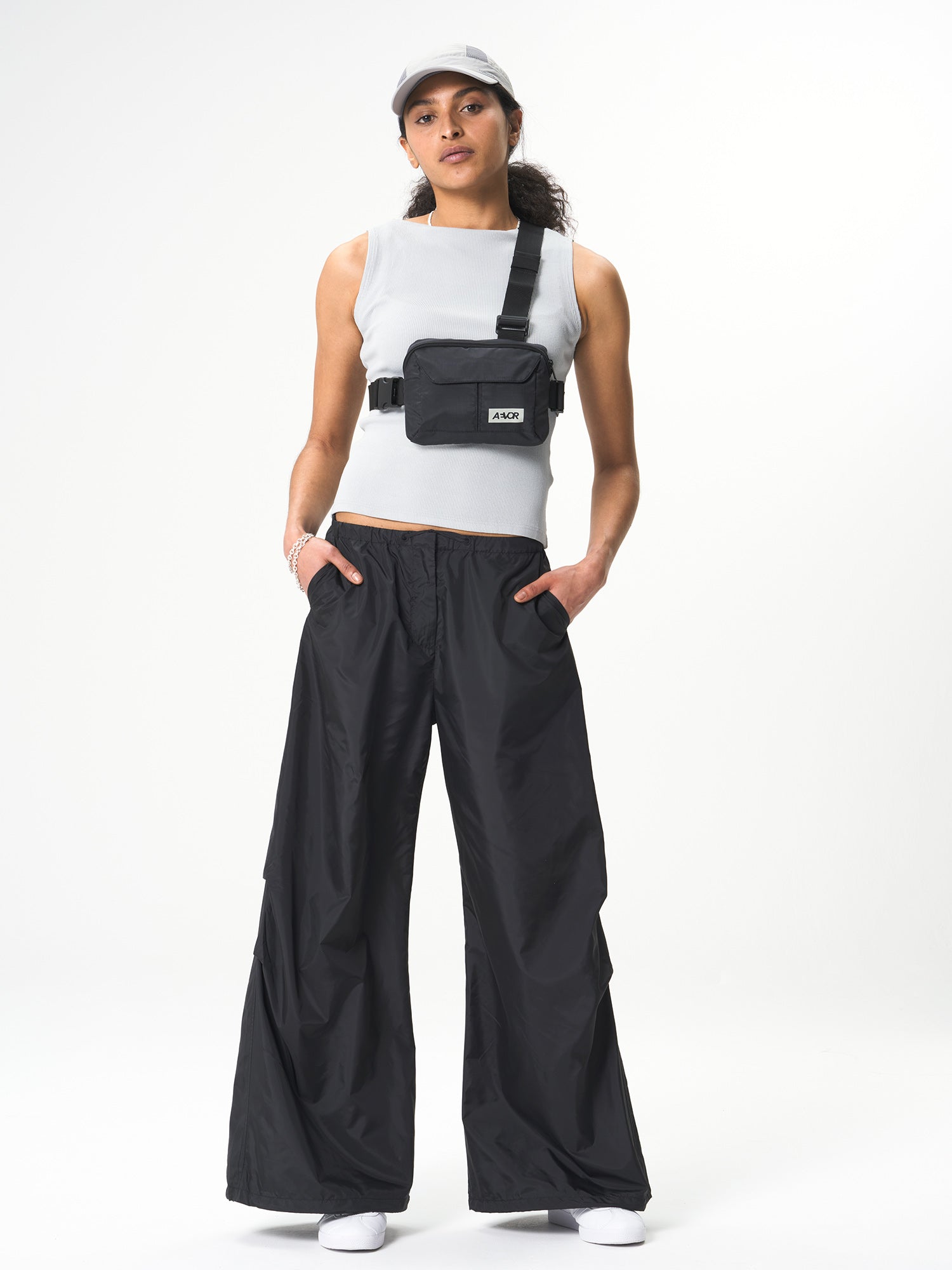 AEVOR-Front-Pack-Ripstop-Black-model-front