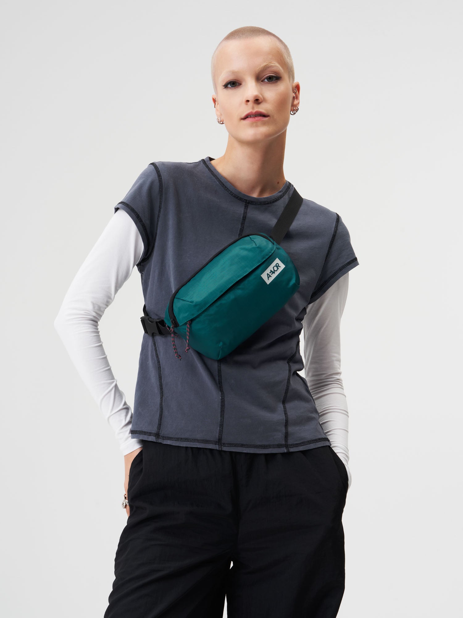 AEVOR-Hip-Bag-Ease-Ripstop-Evergreen-model-female-front