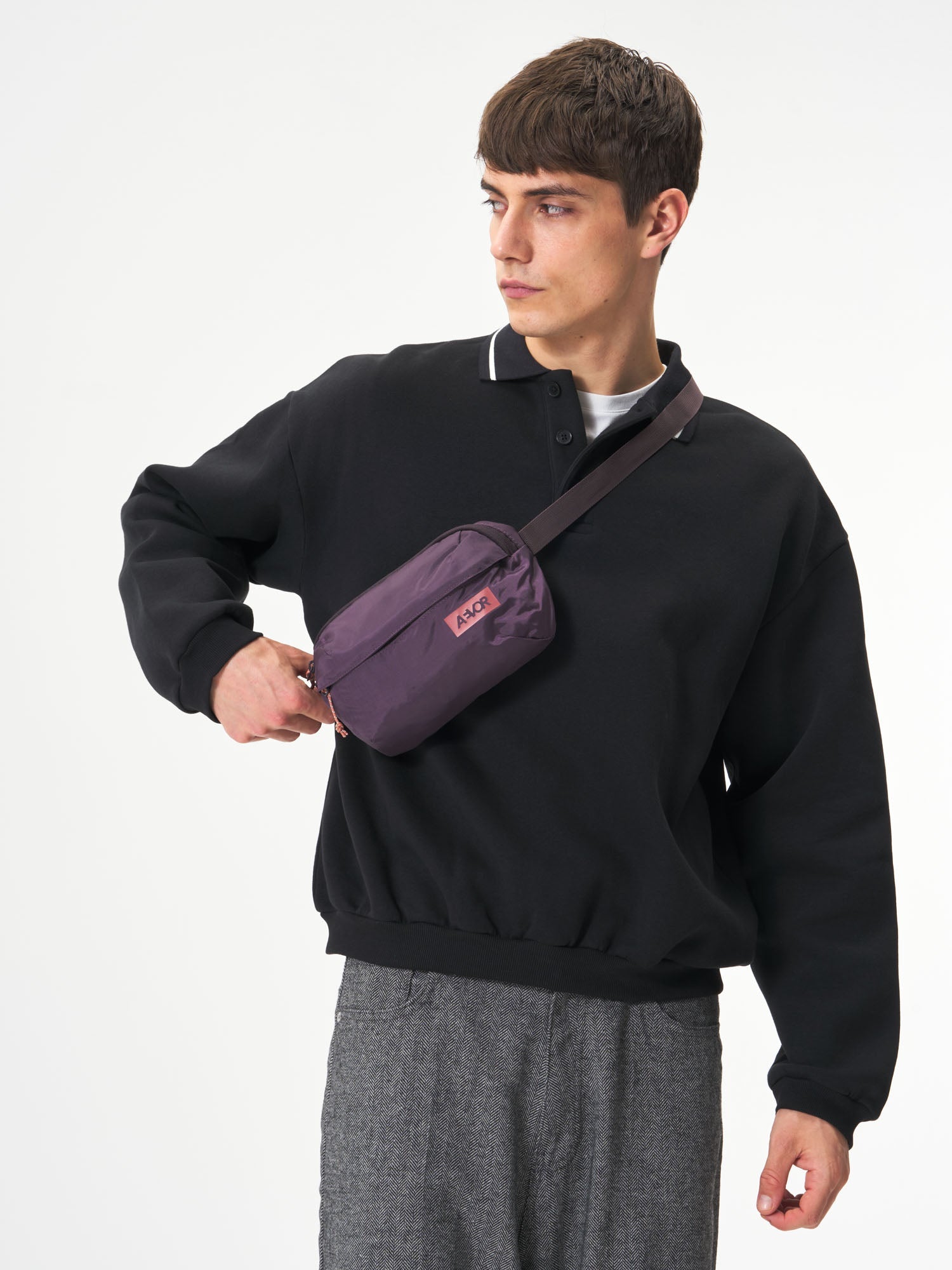 AEVOR-Hip-Bag-Ease-Ripstop-Oxy-Purple-model-male-front