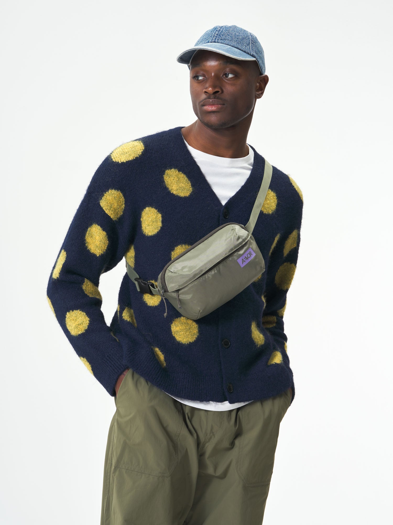 AEVOR-Hip-Bag-Ease-Ripstop-Violett-Sage-model-male-front