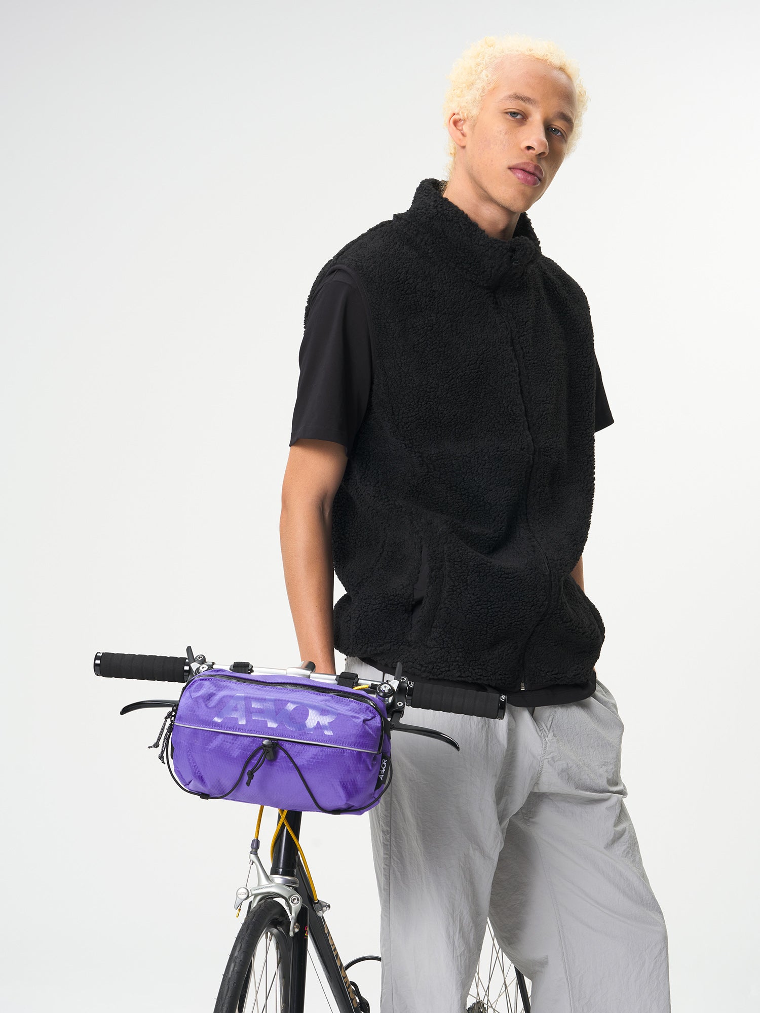 AEVOR-Bar-Bag-Proof-Purple-model-front