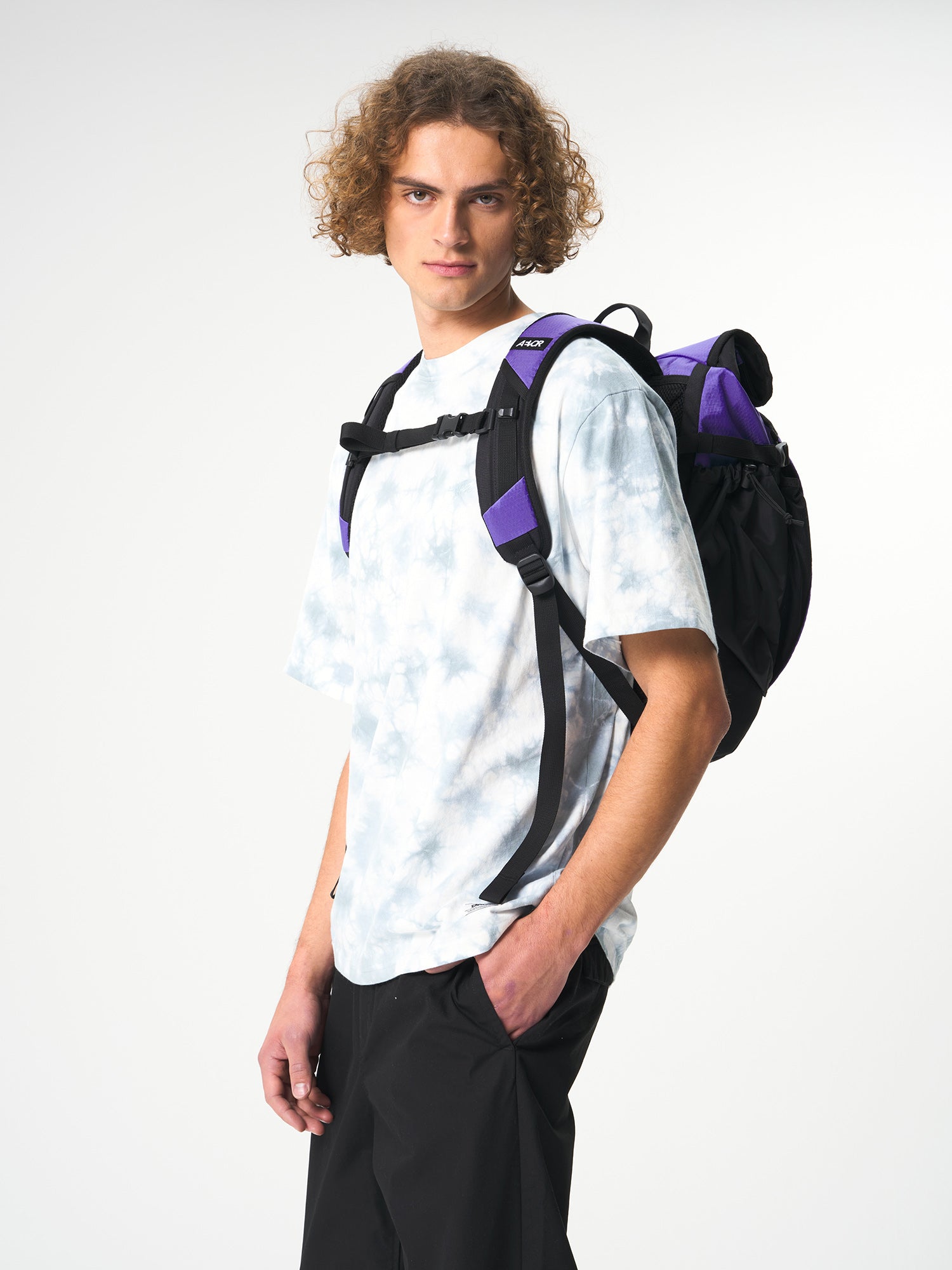 AEVOR-Roll-Pack-Proof-Purple-model-side