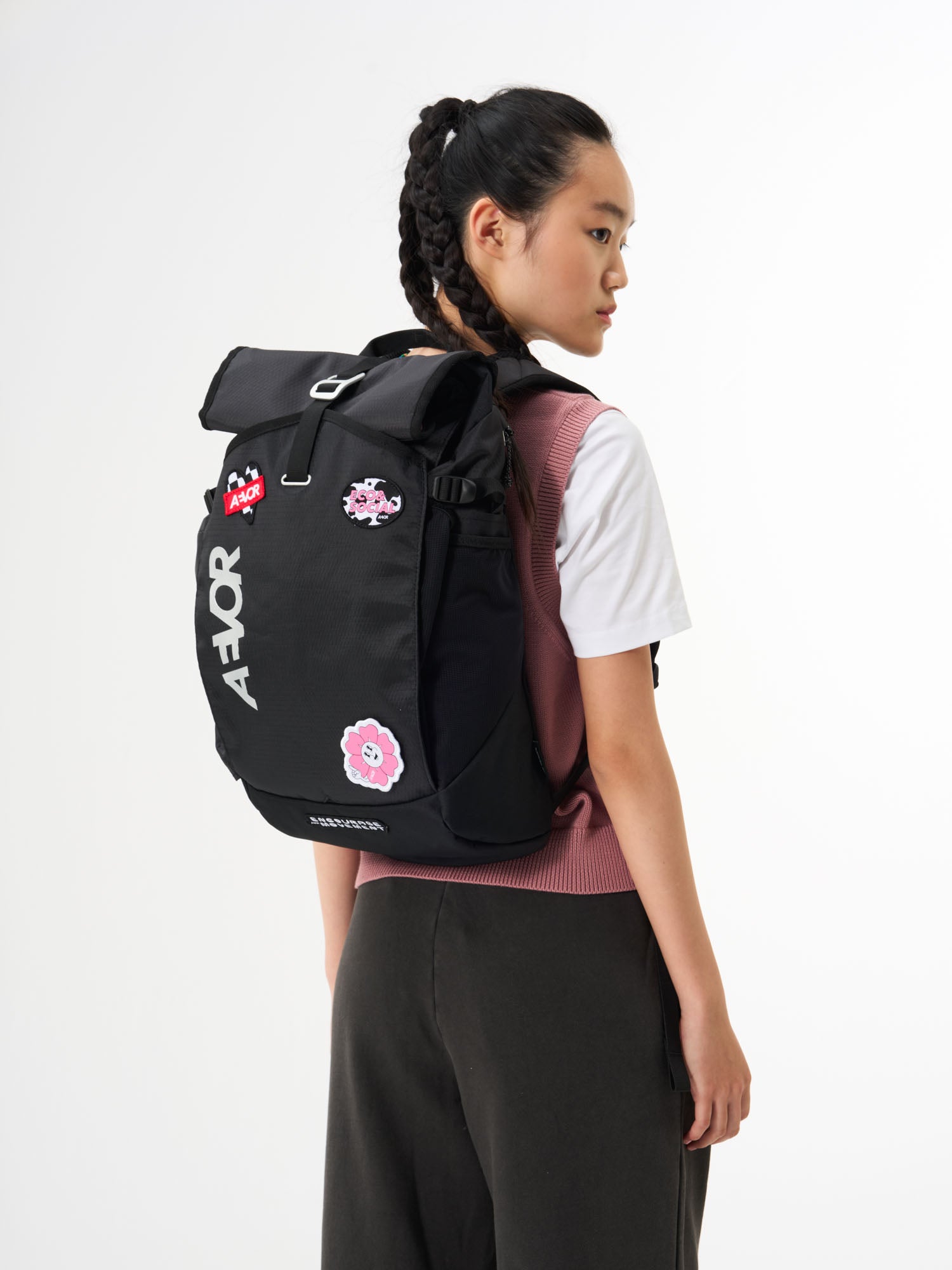 AEVOR-Roll-Pack-Pink-Icing-model-front
