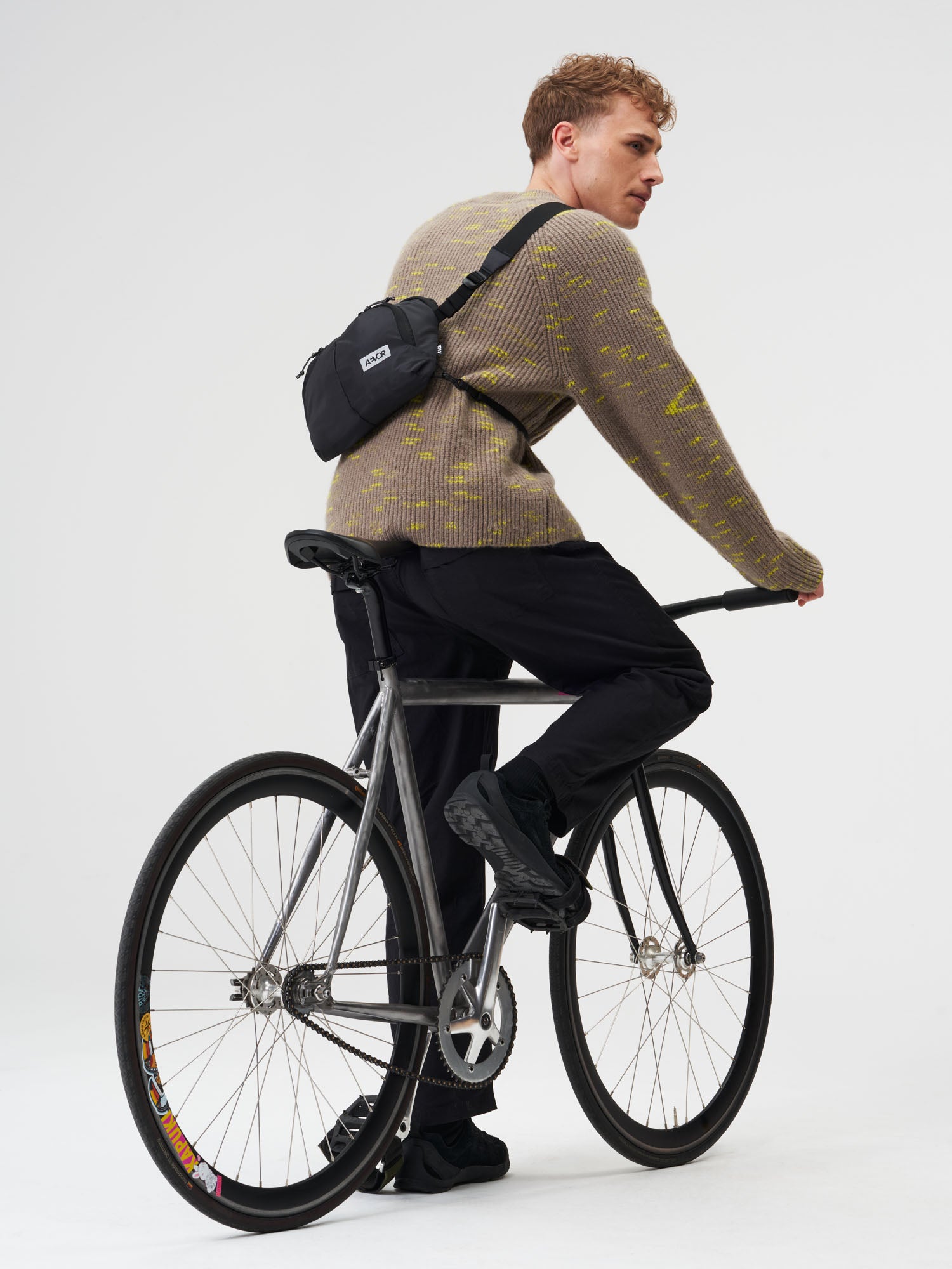 AEVOR-Sacoche-Bag-Ripstop-Black-model-male-front