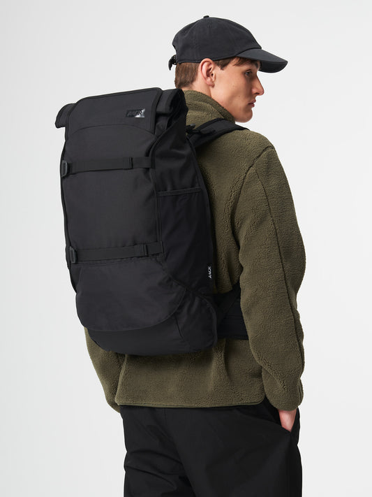 AEVOR-Travel-Pack-Black-Eclipse-model-front