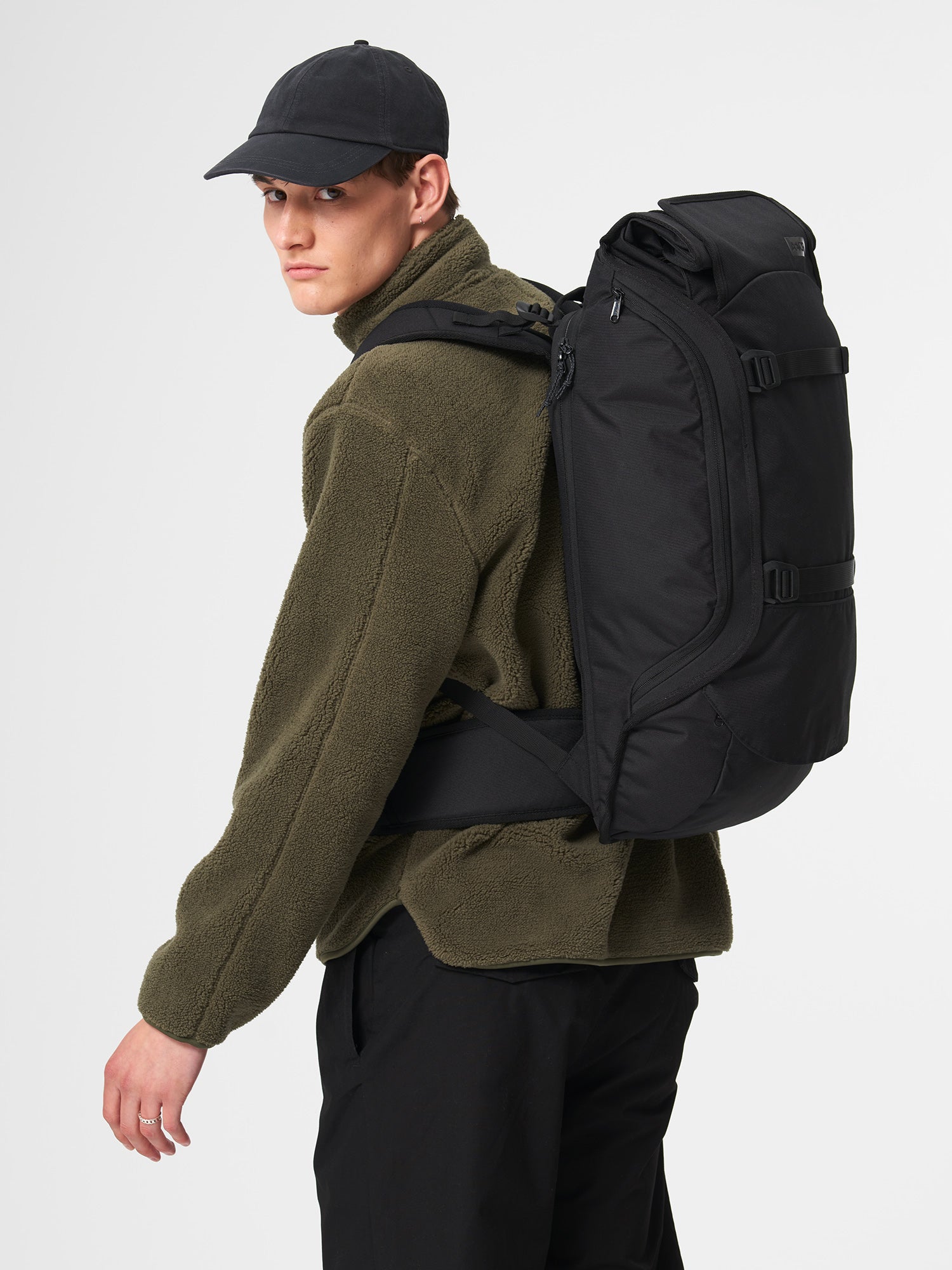AEVOR-Travel-Pack-Black-Eclipse-model-side