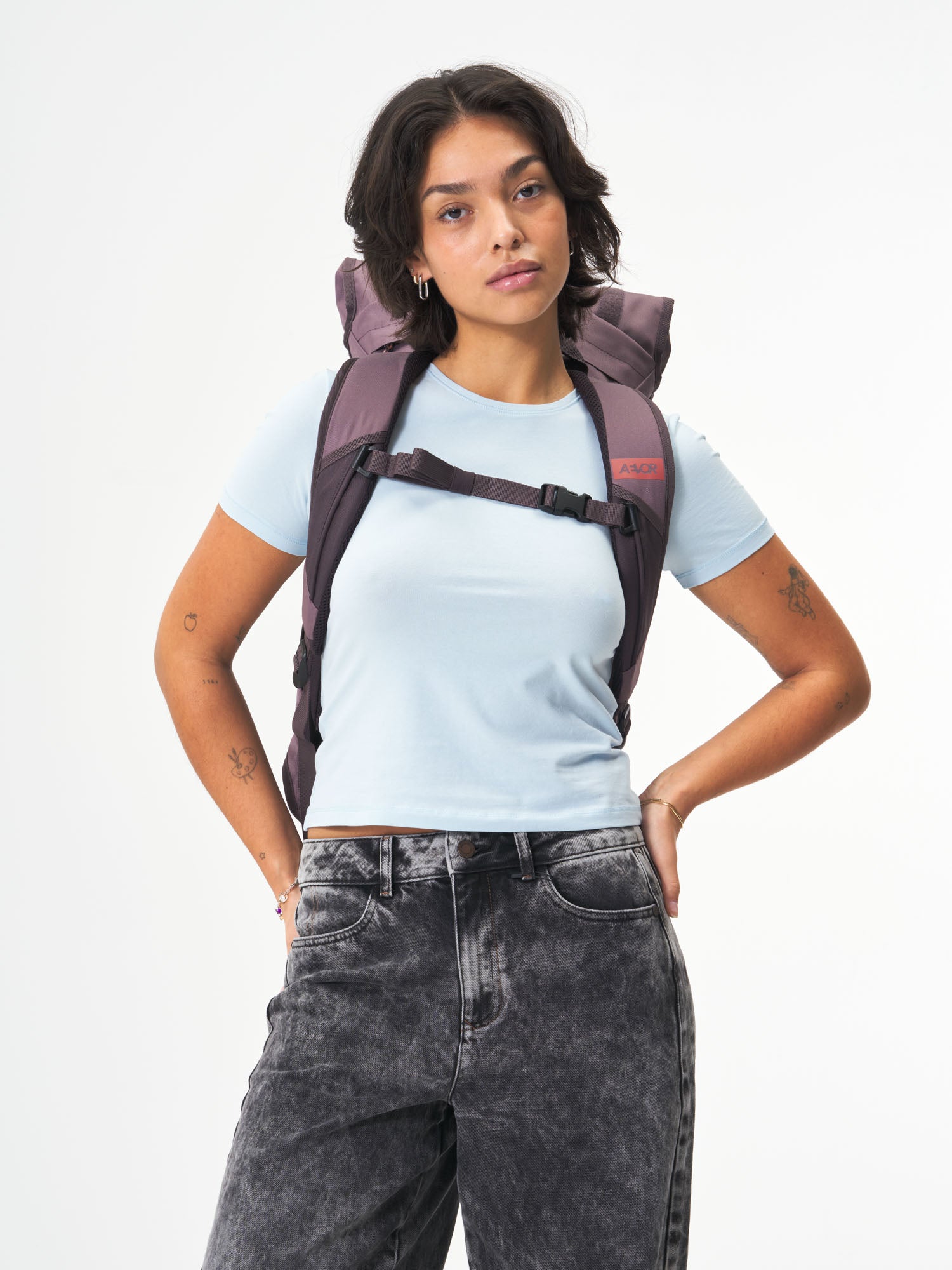 AEVOR-Trip-Pack-Oxy-Purple-model-female-back