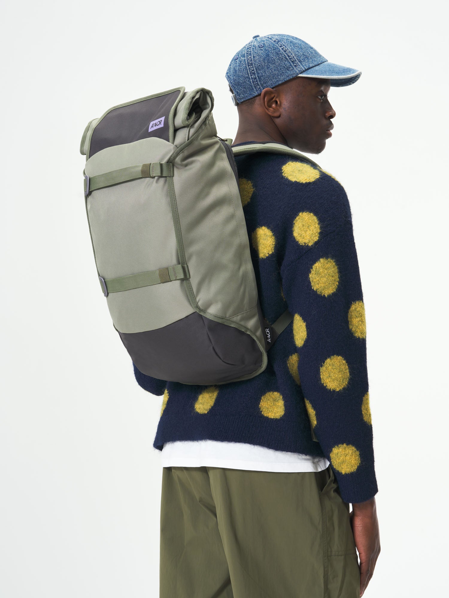 AEVOR-Trip-Pack-Violett-Sage-model-male-front