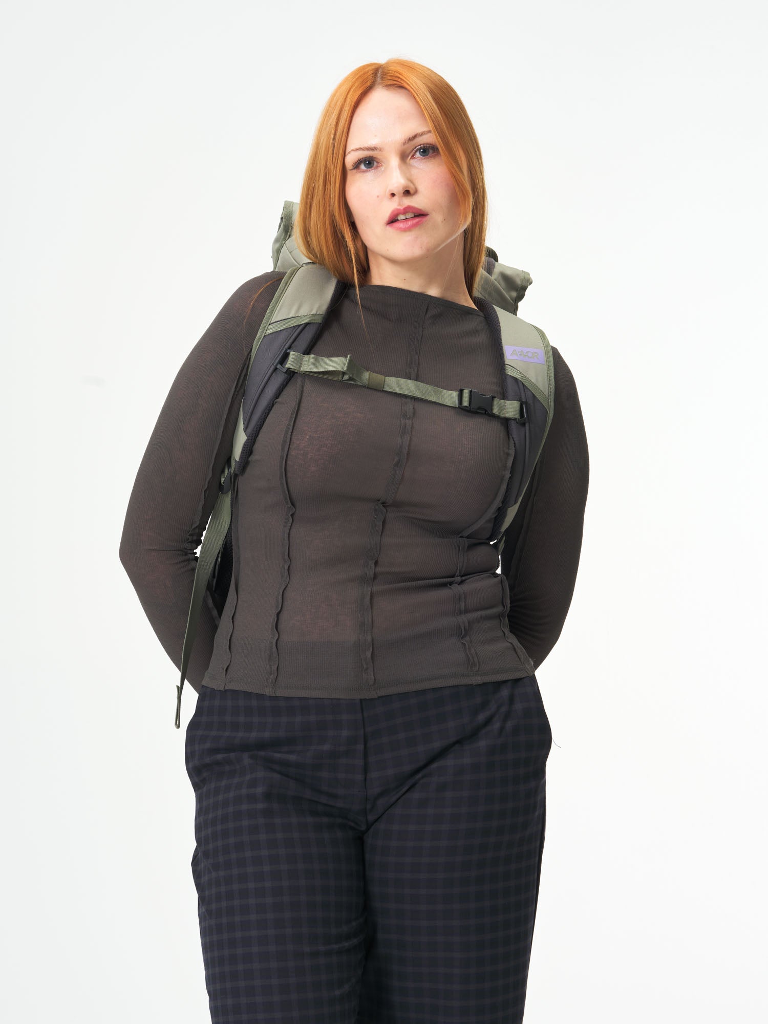 AEVOR-Trip-Pack-Violett-Sage-model-female-back