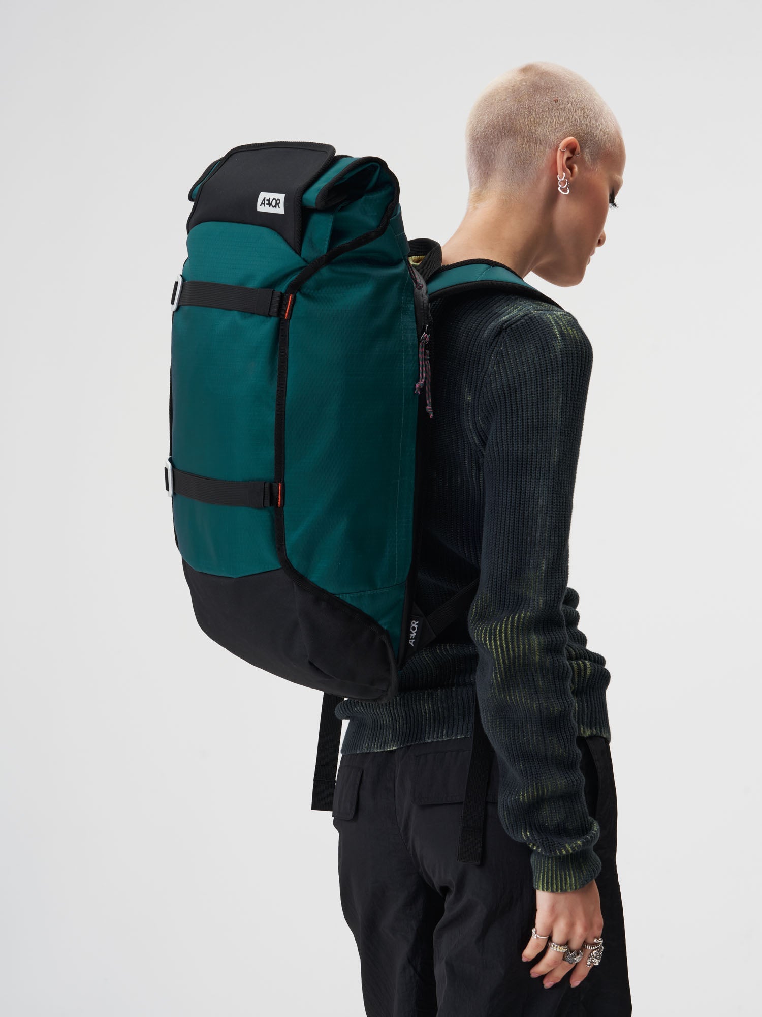 AEVOR-Trip-Pack-Proof-Evergreen-model-female-front