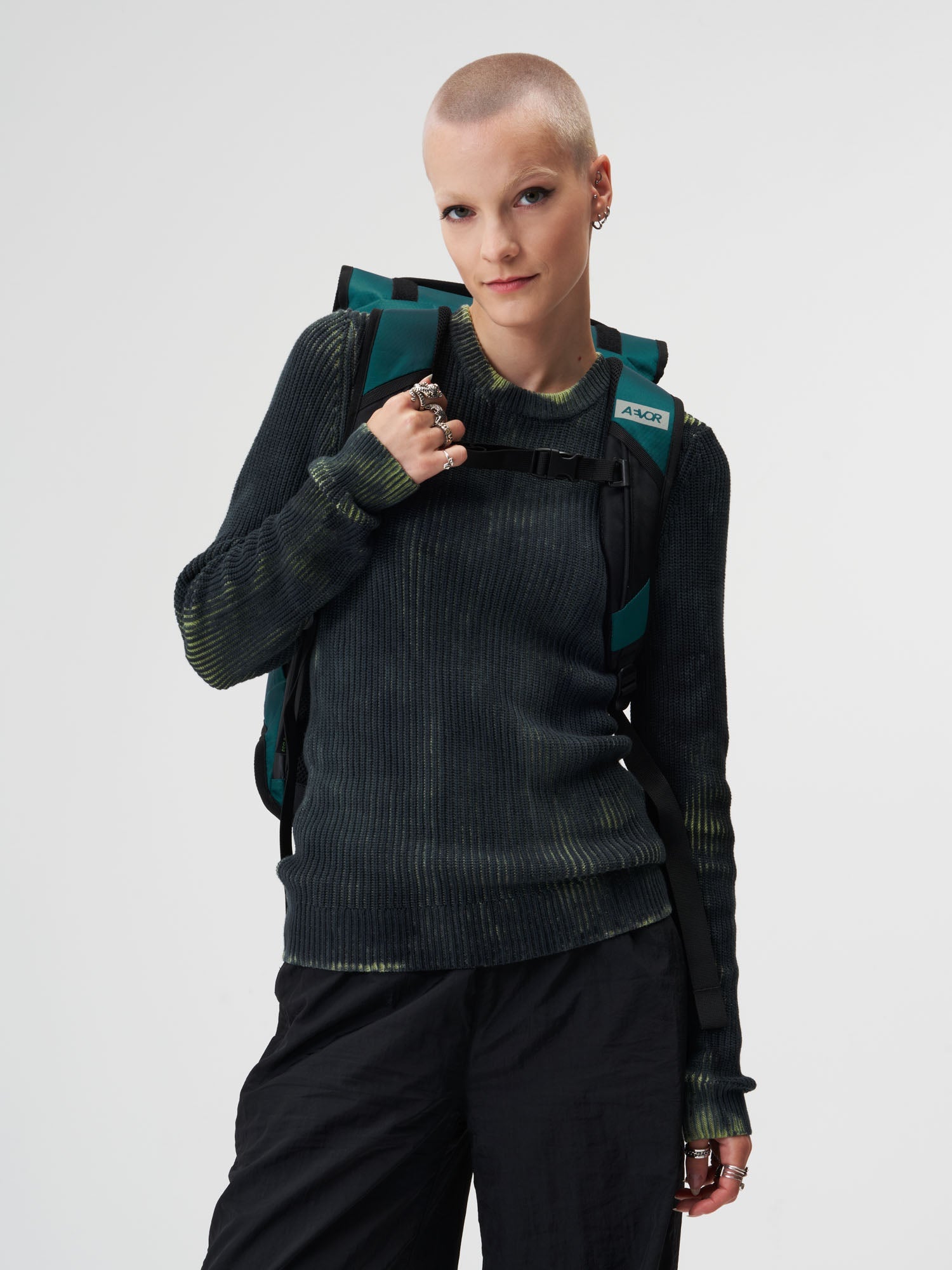 AEVOR-Trip-Pack-Proof-Evergreen-model-female-back