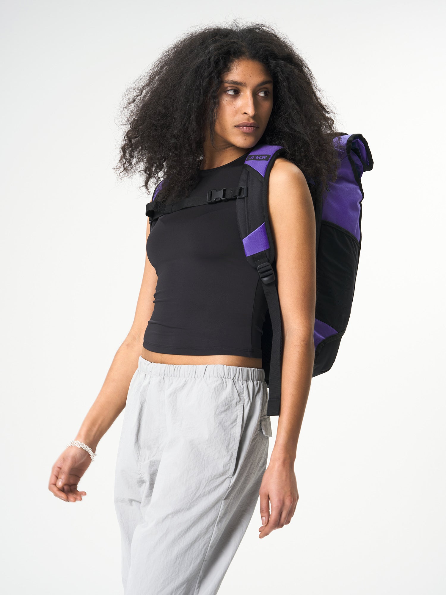 AEVOR-Trip-Pack-Proof-Purple-model-side