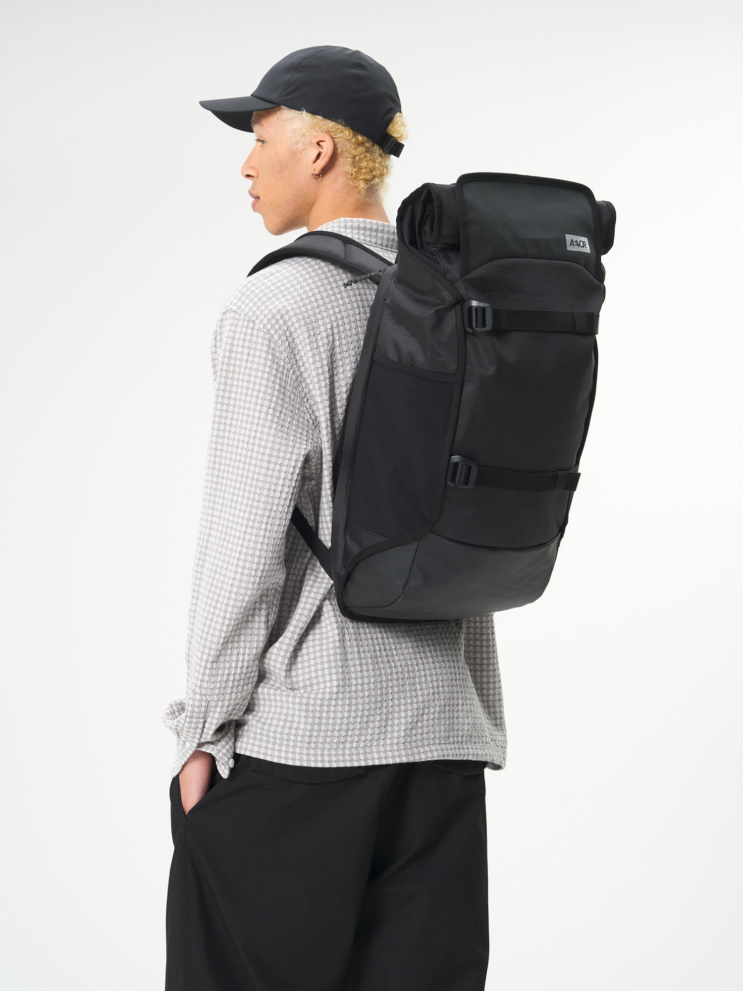 AEVOR-Trip-Pack-Proof-Black-model-front
