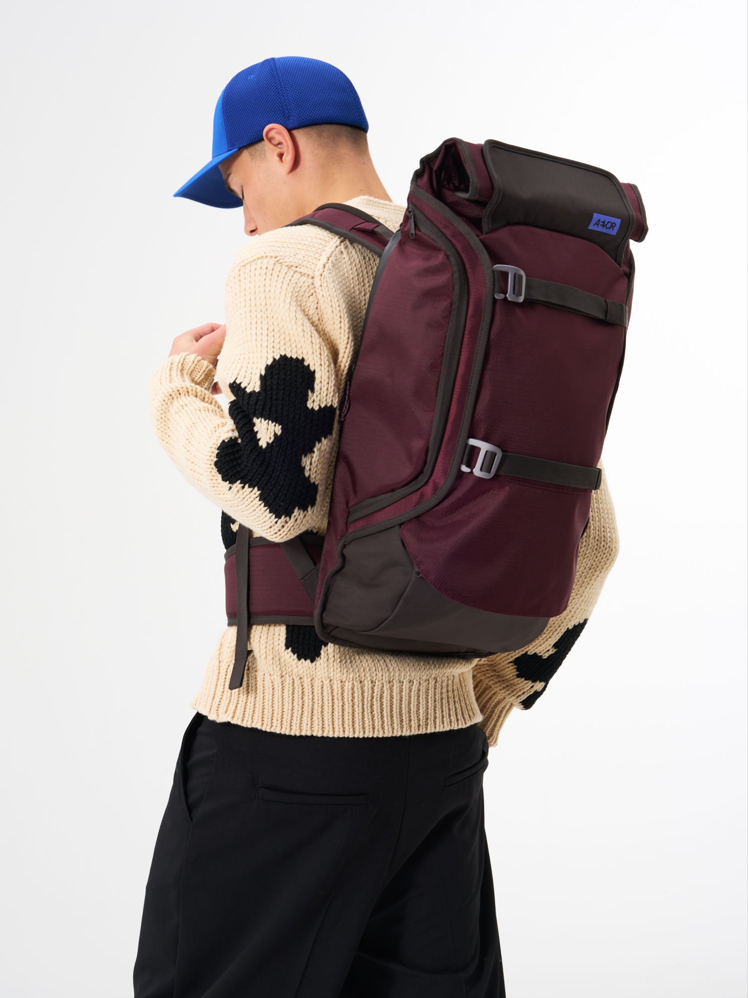 AEVOR-Travel-Pack-Proof-Cherry-Gateau-model-male-front