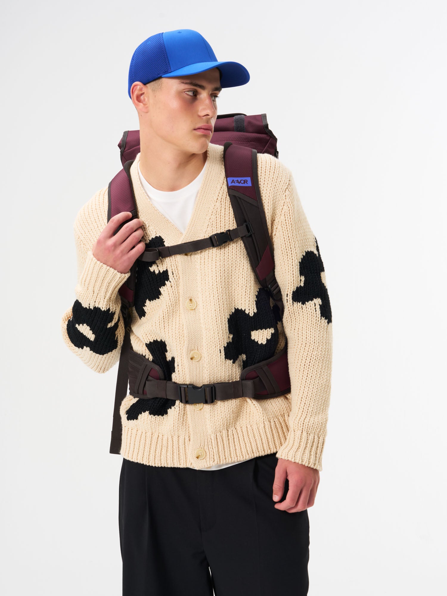 AEVOR-Travel-Pack-Proof-Cherry-Gateau-model-male-back