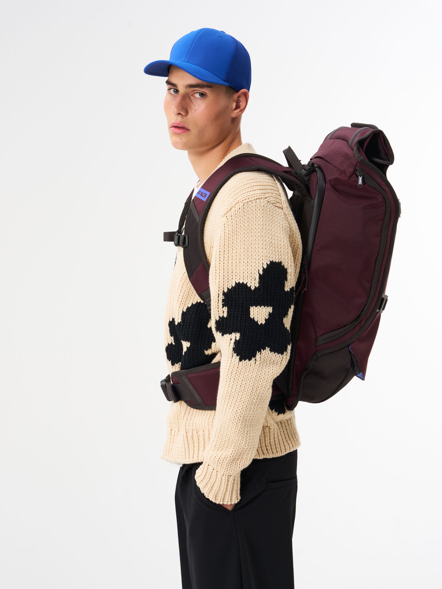 AEVOR-Travel-Pack-Proof-Cherry-Gateau-model-male-side