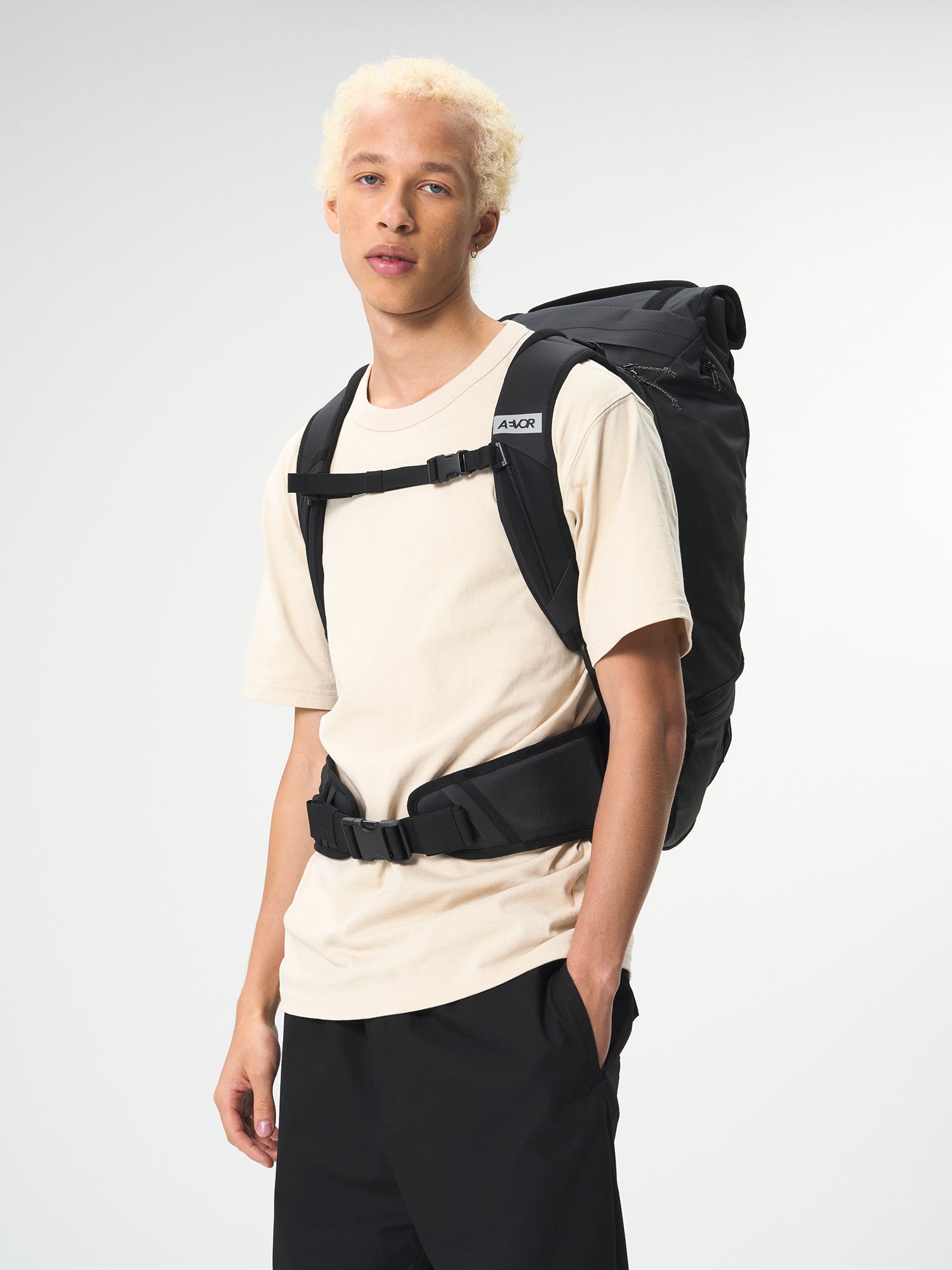 AEVOR-Travel-Pack-Proof-Black-model-back