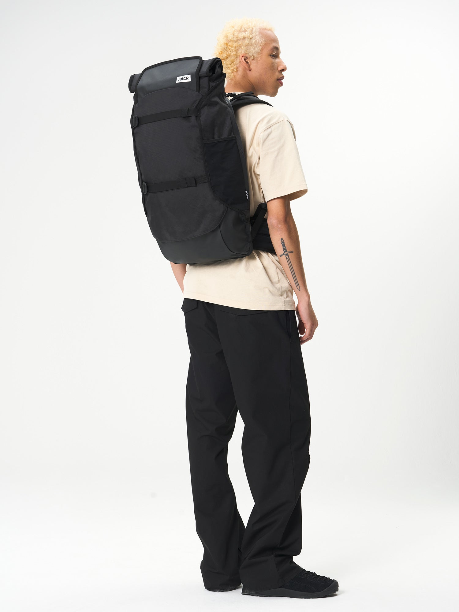 AEVOR-Travel-Pack-Proof-Black-model-front