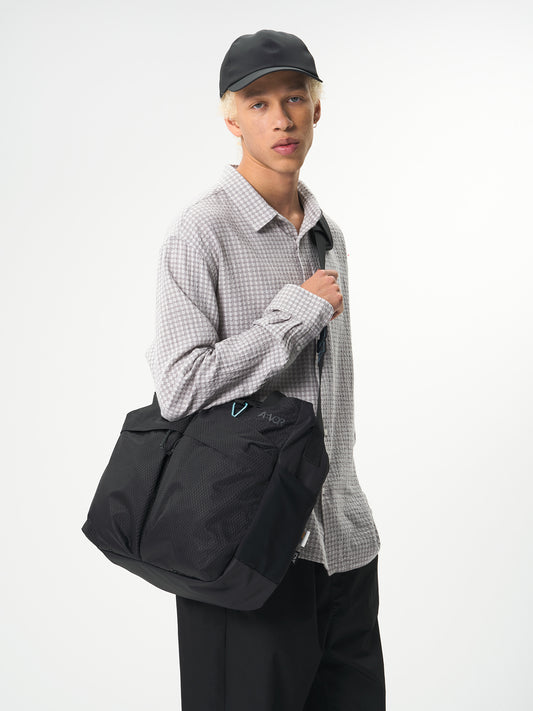 AEVOR-UT-Tote-Utility-Black-model-front