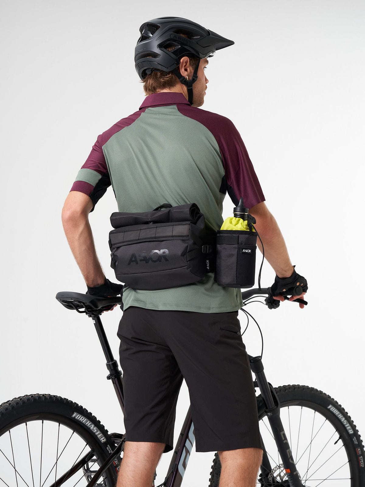 AEVOR-Waist-Pack-Proof-Black-model-front-detail