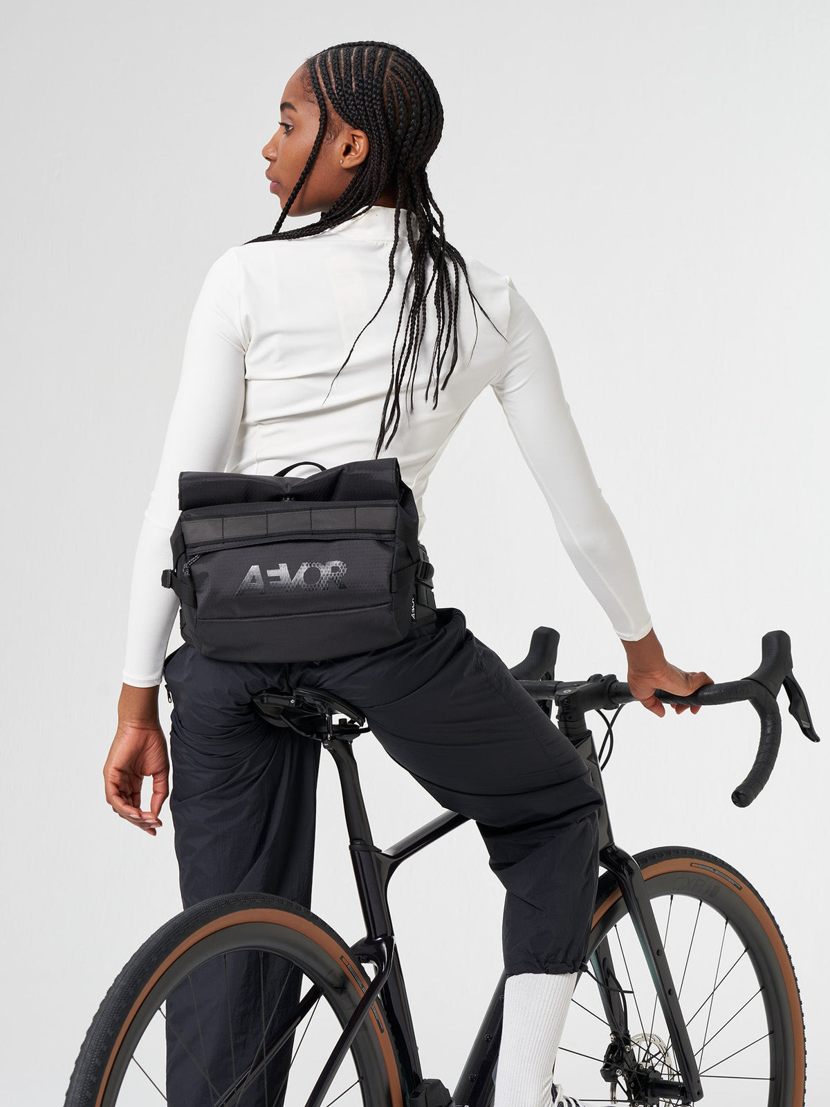 AEVOR-Waist-Pack-Proof-Black-model-front