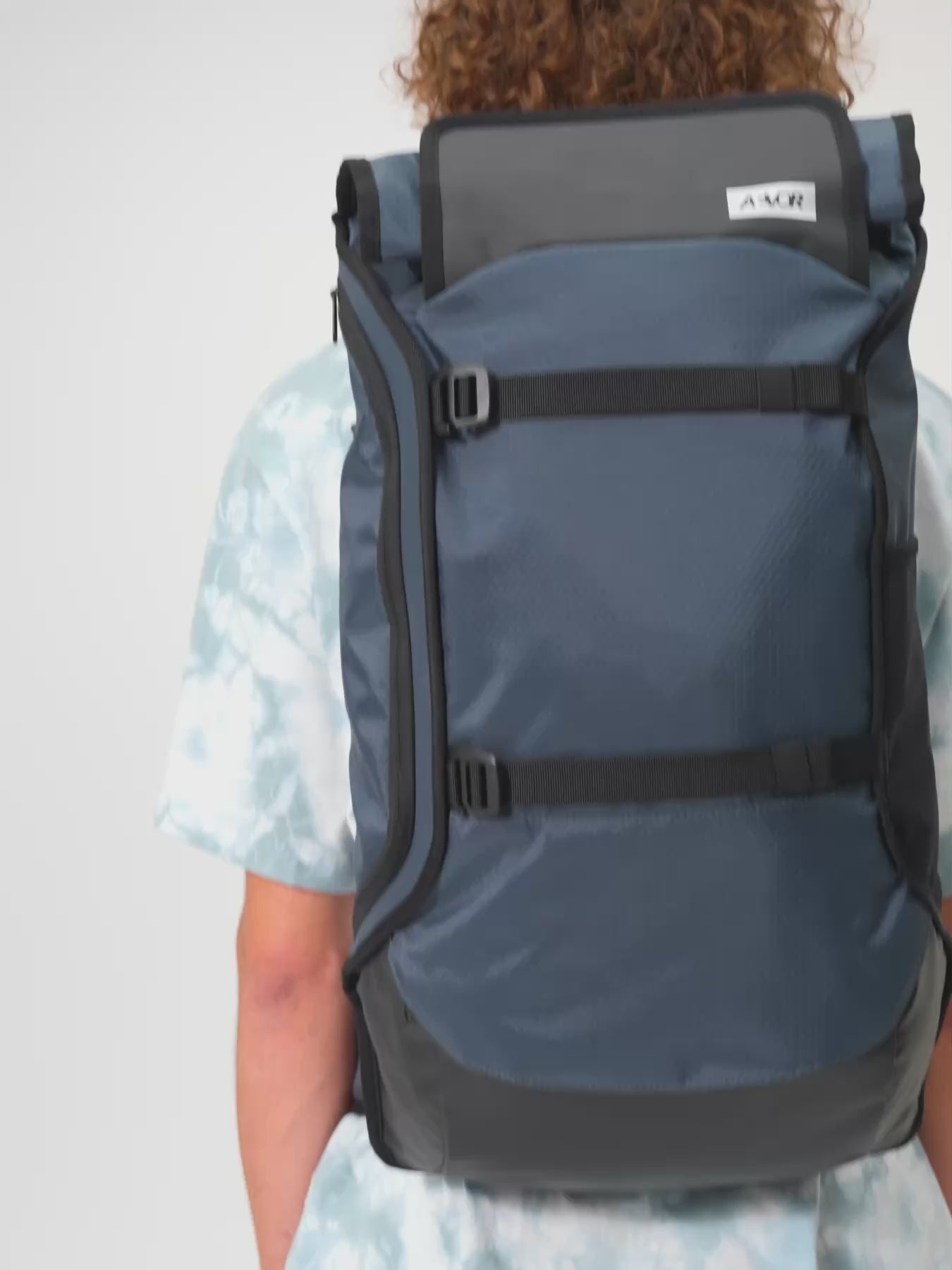 AEVOR-Travel-Pack-Proof-Petrol-model-video