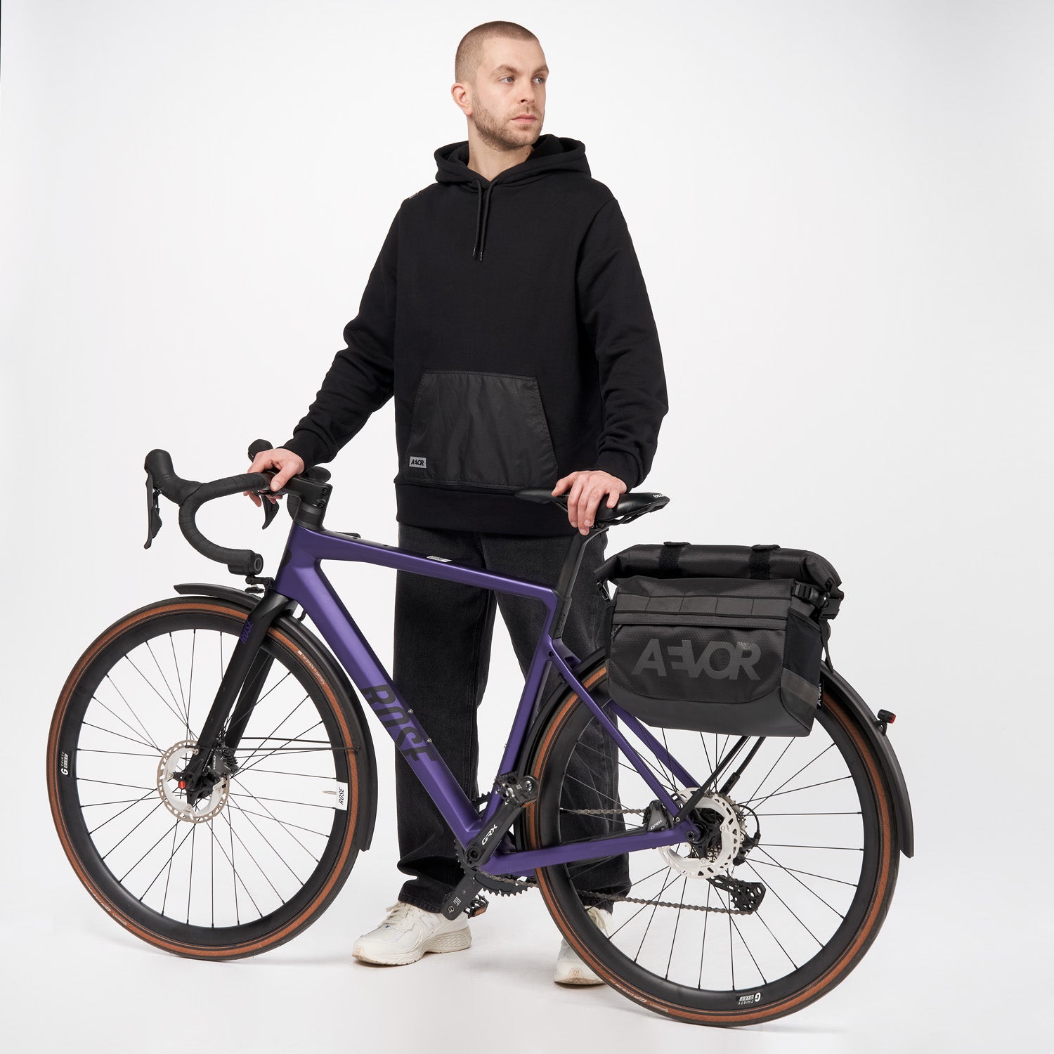 AEVOR-Triple-Bike-Bag-Proof-Black-model-front