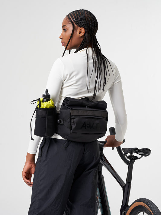 AEVOR-Bike-Stem-Bag-Proof-Black-model-front-details