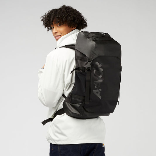 AEVOR-backpack-Explore-Pack-Proof-Black-model-side