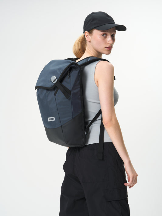 AEVOR-Daypack-Proof-Petrol-model-front