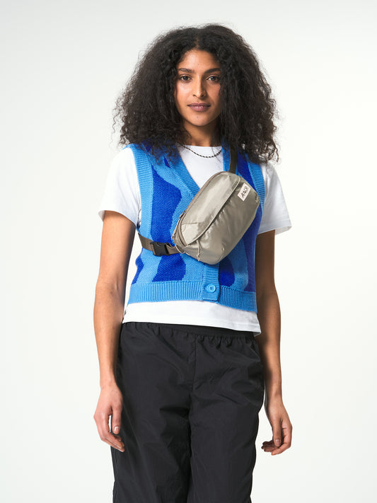 AEVOR-Hip-Bag-Ease-Ripstop-Oakwood-model-front