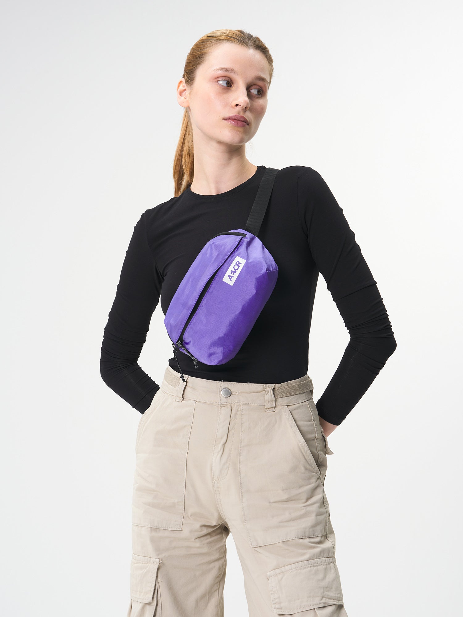 AEVOR-Hip-Bag-Ease-Ripstop-Purple-model-female-front