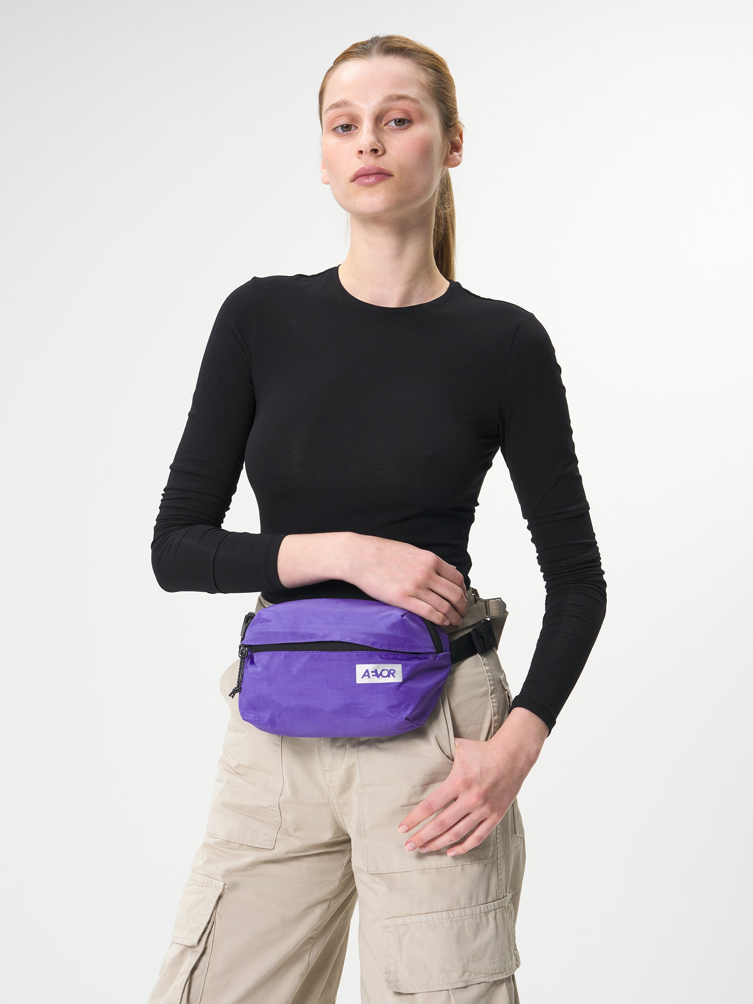 AEVOR-Hip-Bag-Ease-Ripstop-Purple-model-female-front