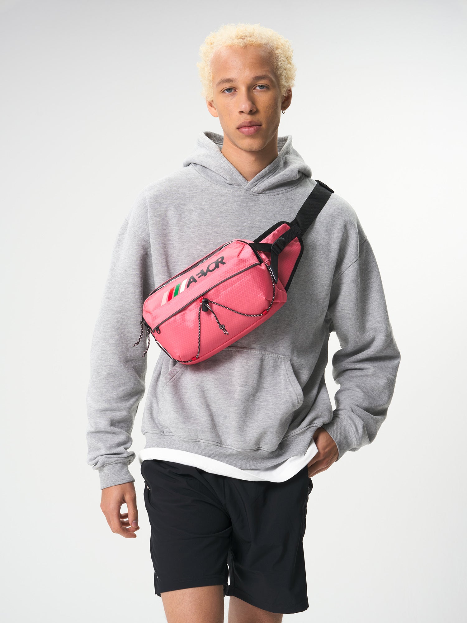 AEVOR-Bar-Bag-Proof-Pink-Flash-model-front