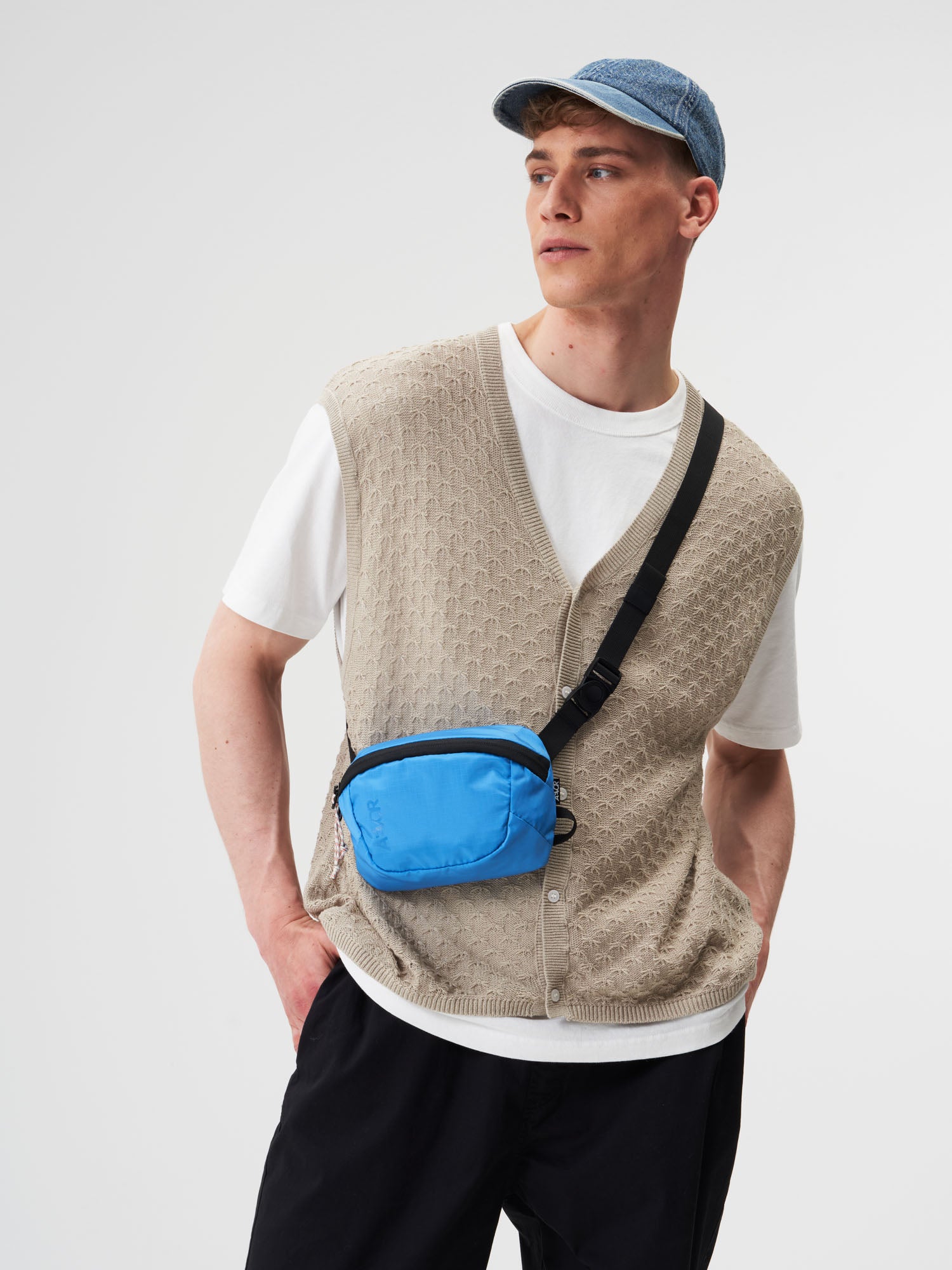 AEVOR-Hip-Bag-Move-Ripstop-Retro-Blue-model-male-front