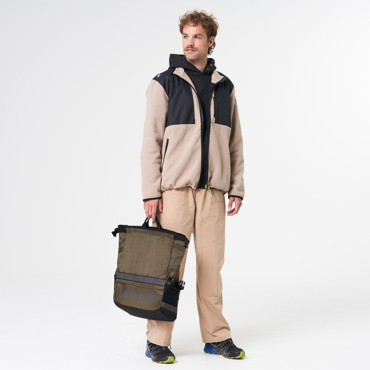 AEVOR-Triple-Bike-Bag-Proof-Olive-Gold-model-front