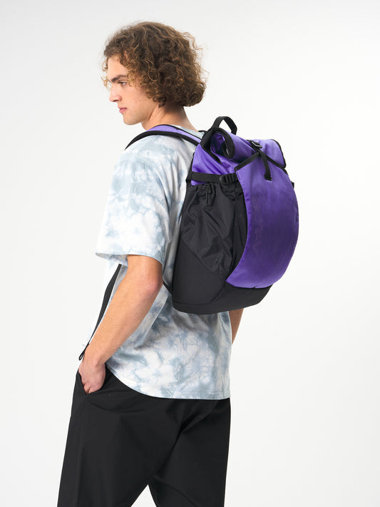AEVOR-Roll-Pack-Proof-Purple-model-side