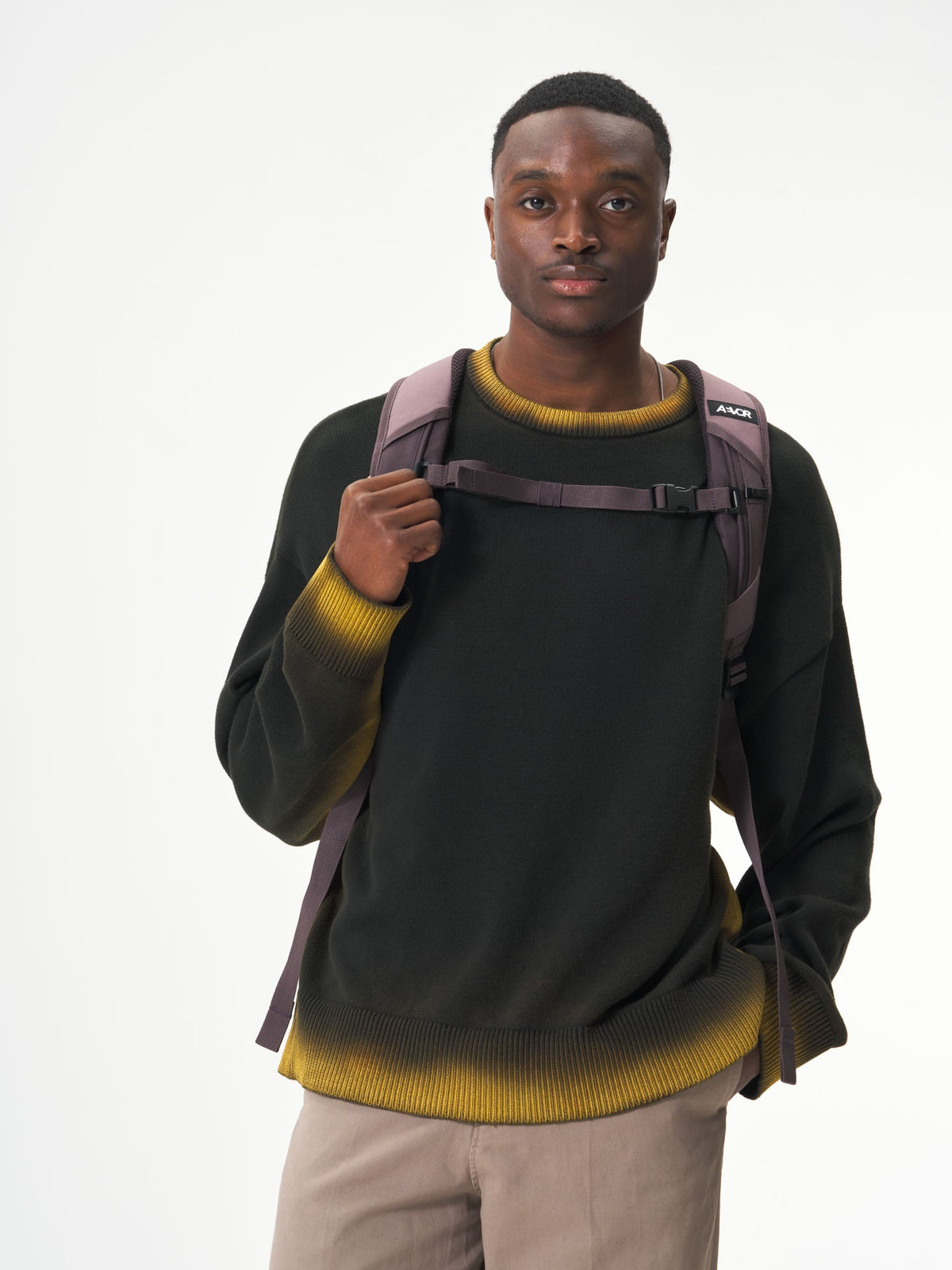 AEVOR-Roll-Pack-Proof-Bleach-Dye-model-male-back