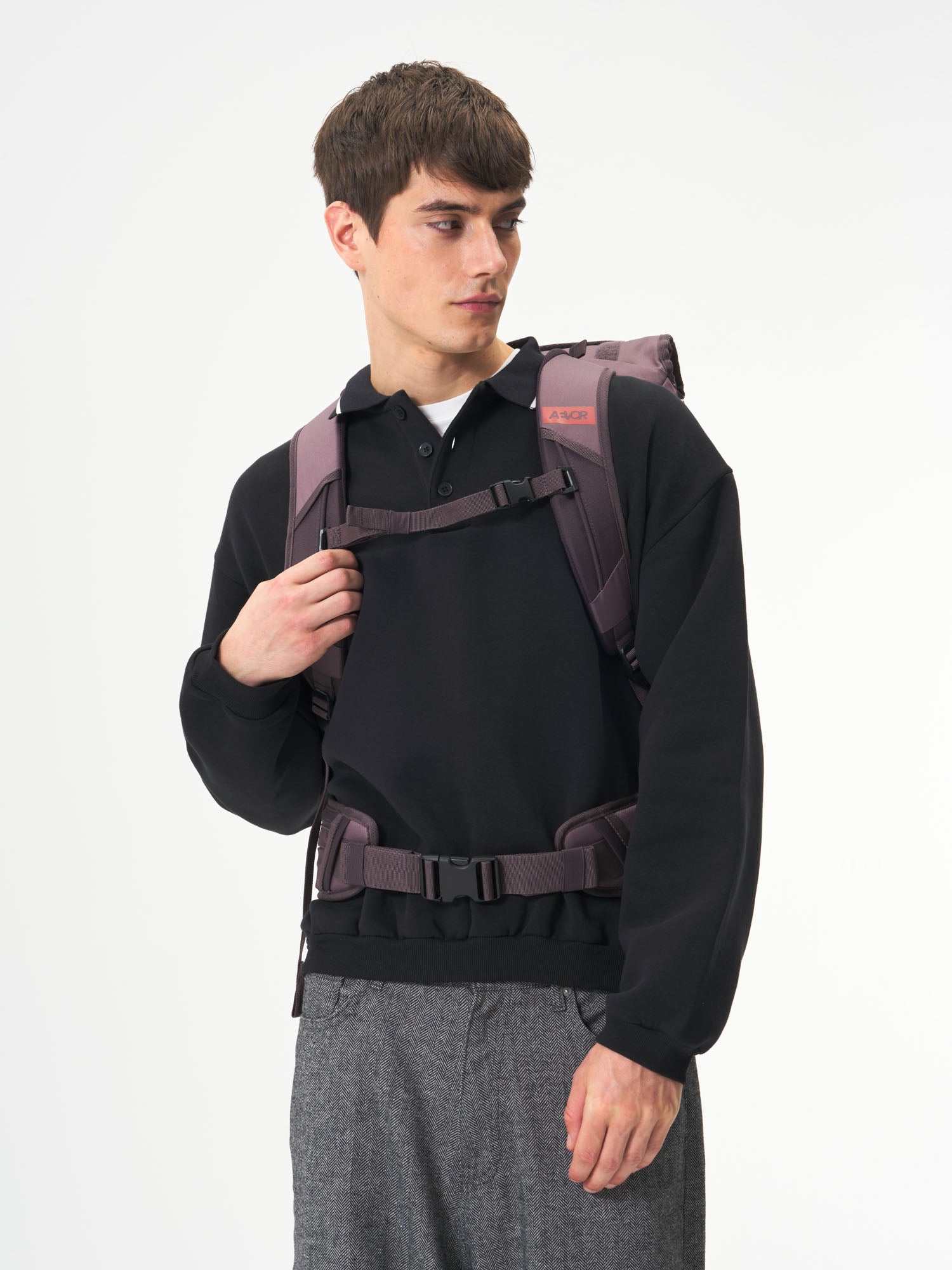 AEVOR-Travel-Pack-Oxy-Purple-model-male-back