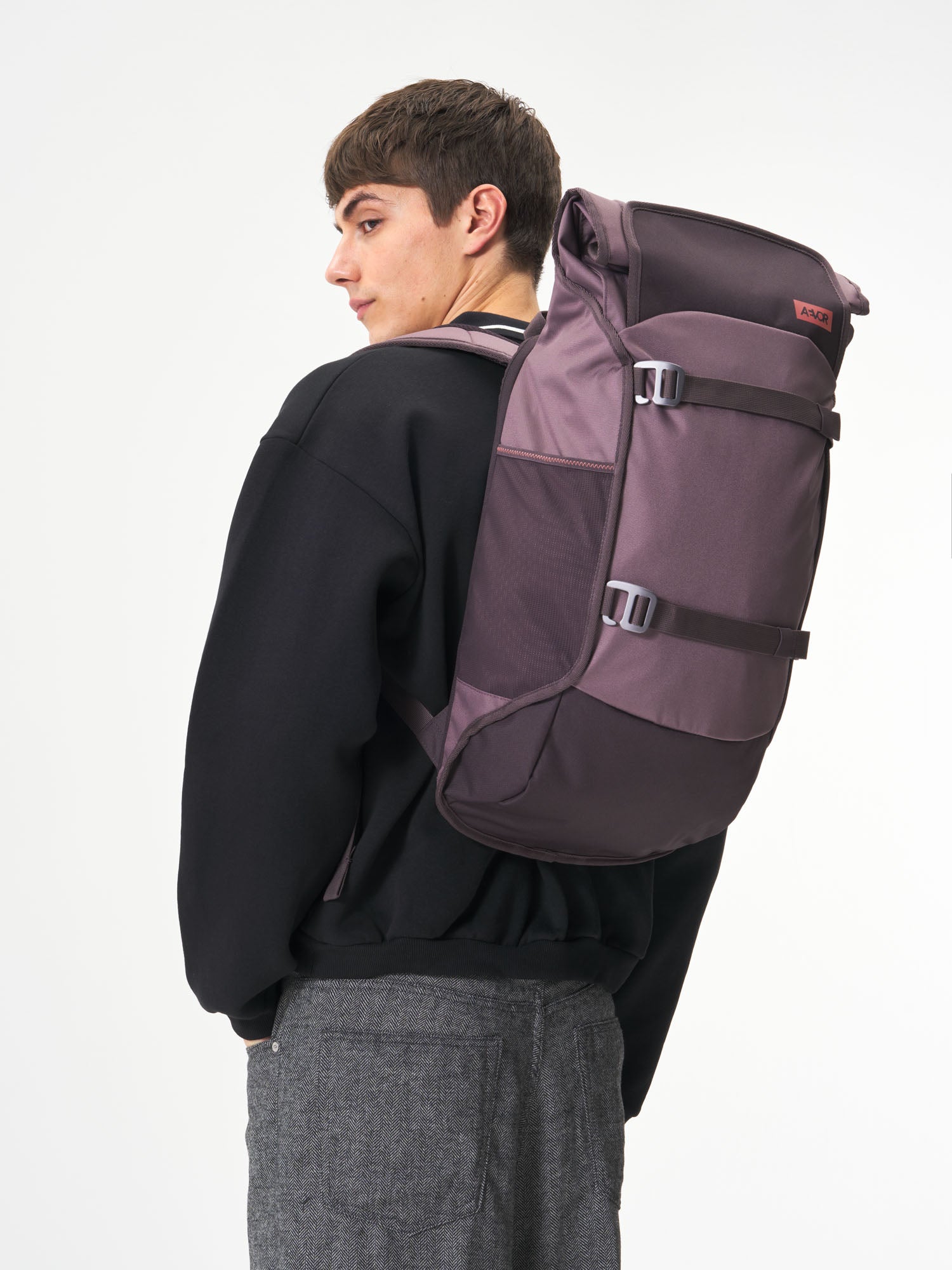 AEVOR-Trip-Pack-Oxy-Purple-model-male-front