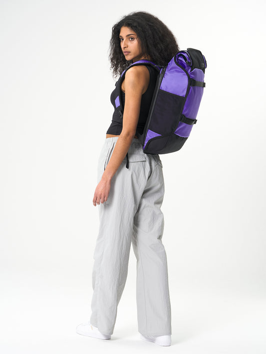 AEVOR-Trip-Pack-Proof-Purple-model-side
