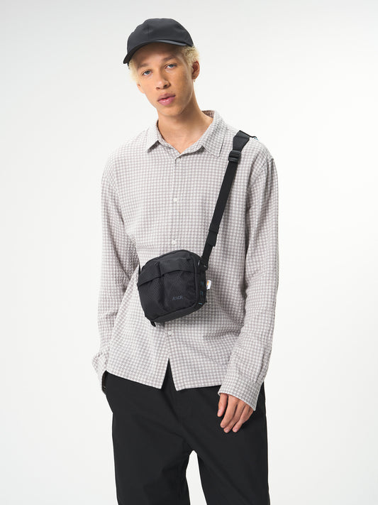 AEVOR-UT-Pouch-Utility-Black-model-front