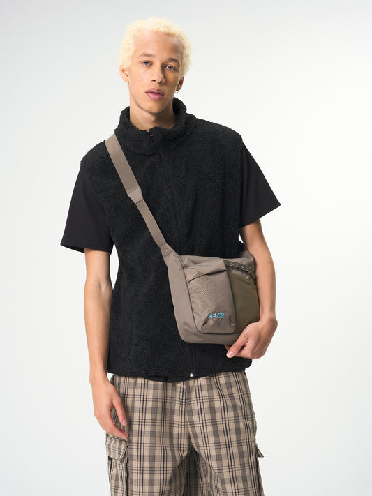 AEVOR-UT-Sacoche-Utility-Coffee-Brown-model-front