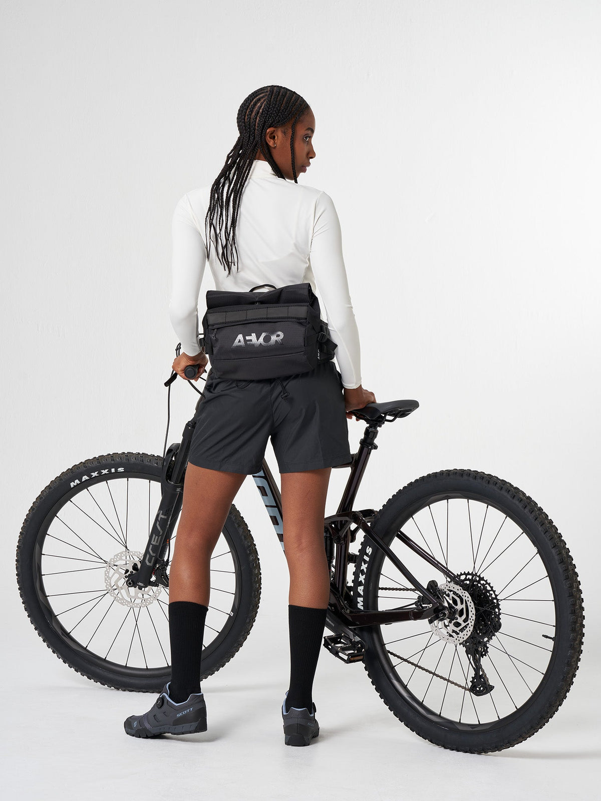 AEVOR-Waist-Pack-Proof-Black-model-front